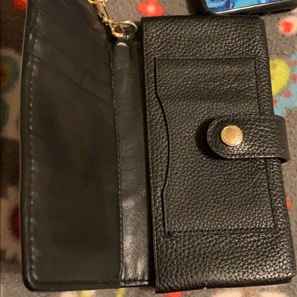Coach wristlet can hold a smaller phone